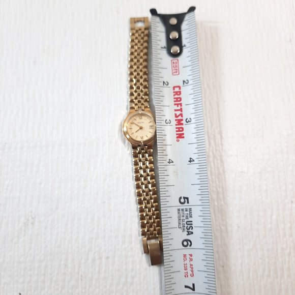 Vintage Bulova Women Watch Gold Stainless Steel‎ Water Resist Battery Date round main image 7